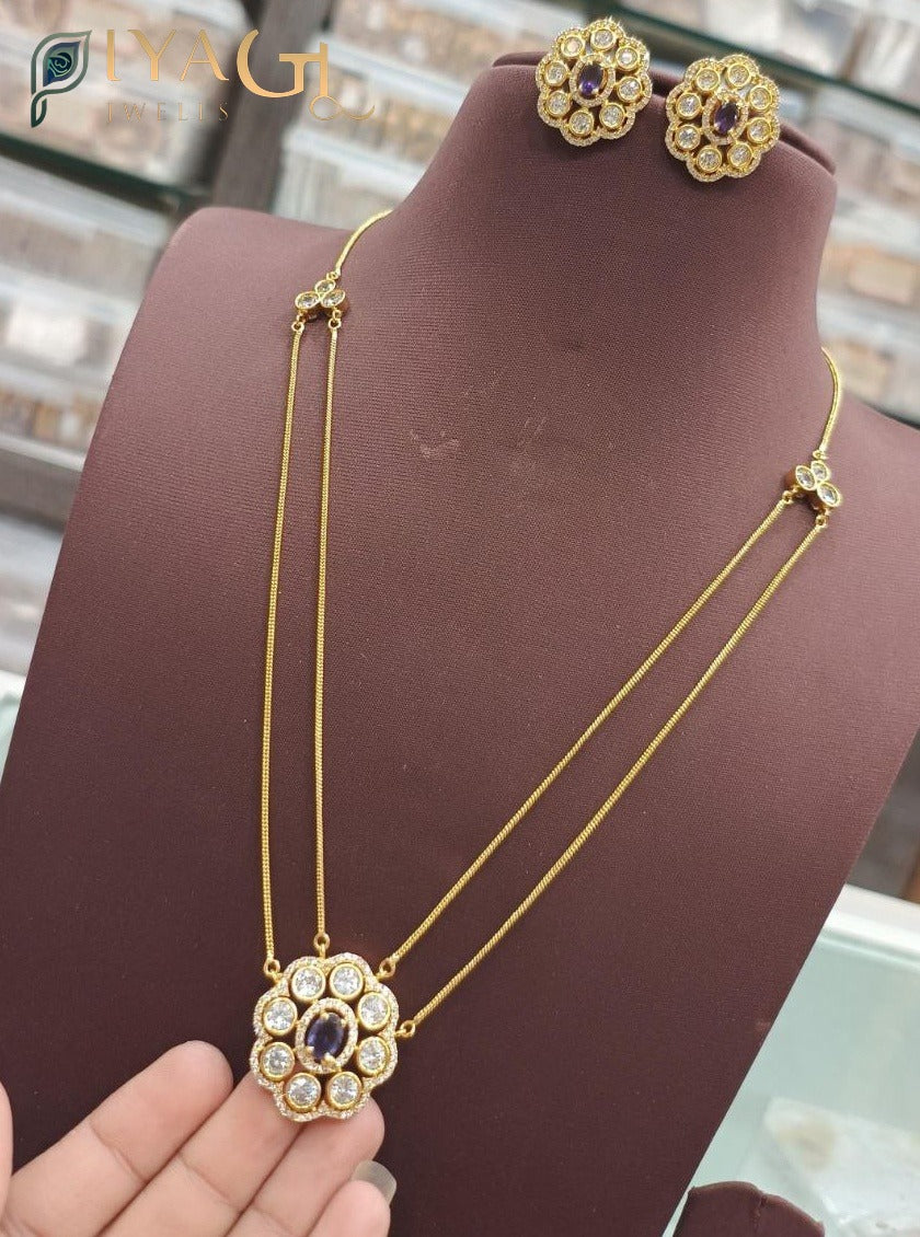 Gold tone floral design stone necklace earring set for festive occasions - PiyaGuJwells