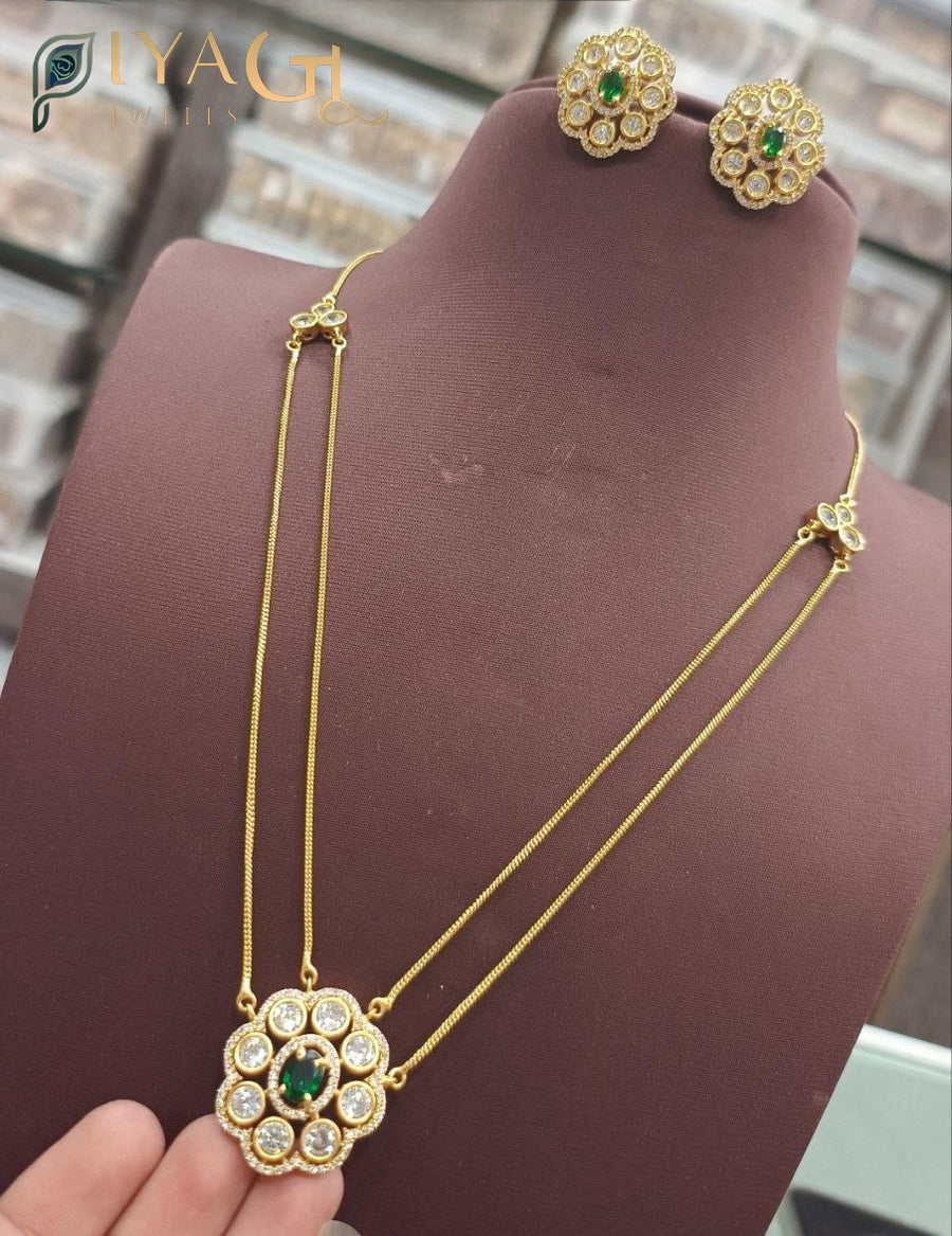 Gold tone floral design stone necklace earring set for festive occasions - PiyaGuJwells