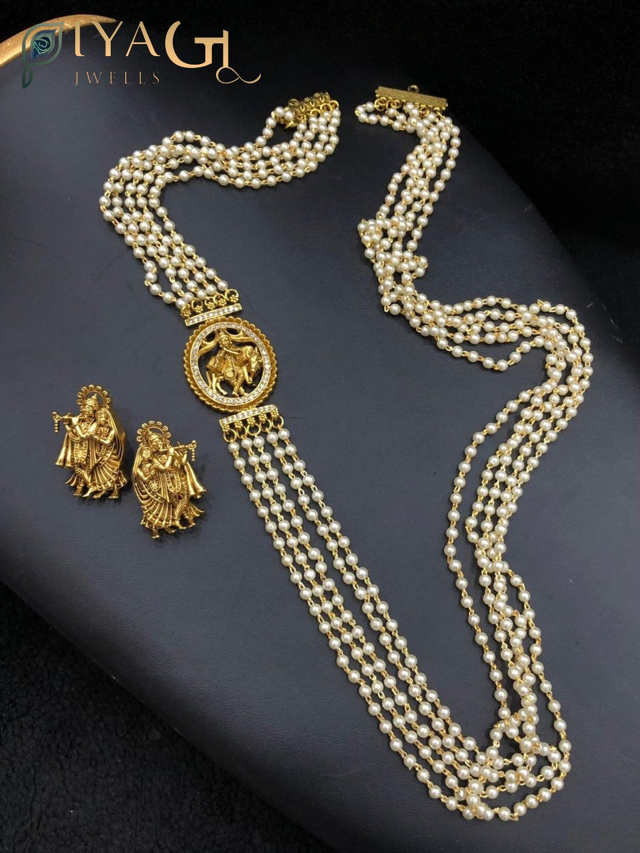 Gold antique finish white cubic zirconia layered necklace and earring set for festive wear - PiyaGuJwells