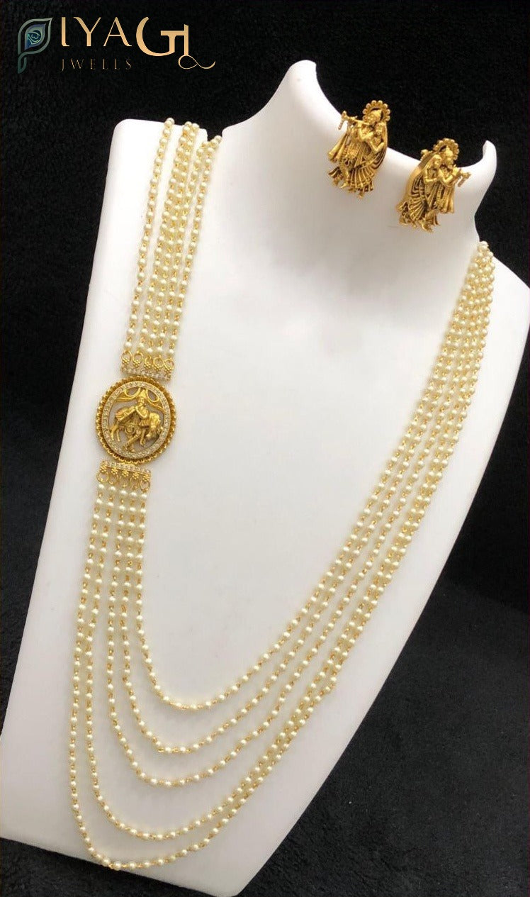 Gold antique finish white cubic zirconia layered necklace and earring set for festive wear - PiyaGuJwells