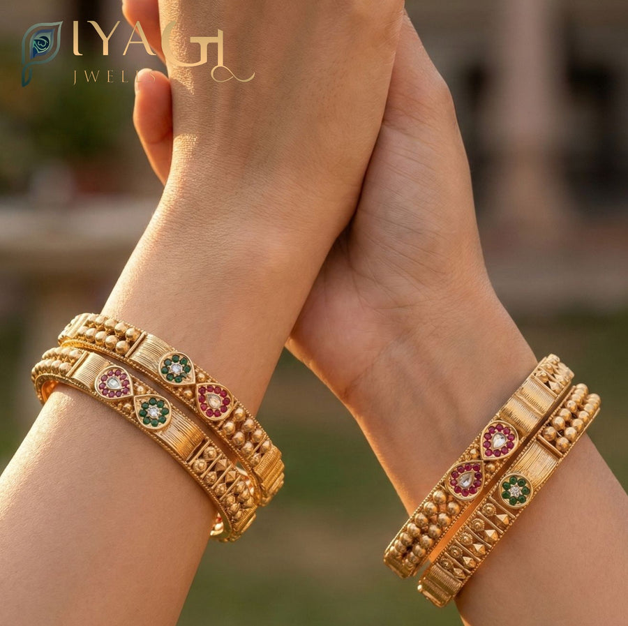 Gold tone antique finish floral design layered artificial jewellery bangles set for ethnic wear - PiyaGuJwells