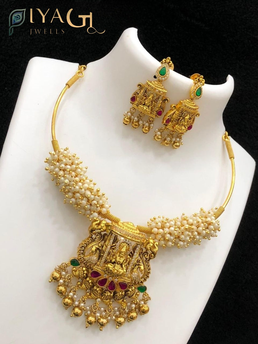 Multicolor cubic zirconia gold tone layered necklace set for festive occasions - PiyaGuJwells