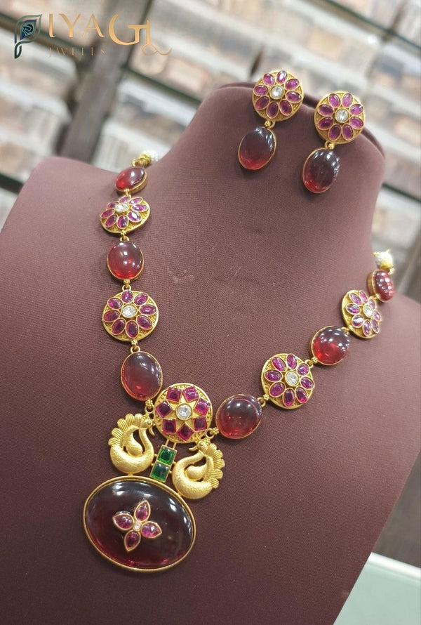 Gold tone floral design red kundan stone necklace earring set for festive wear - PiyaGuJwells