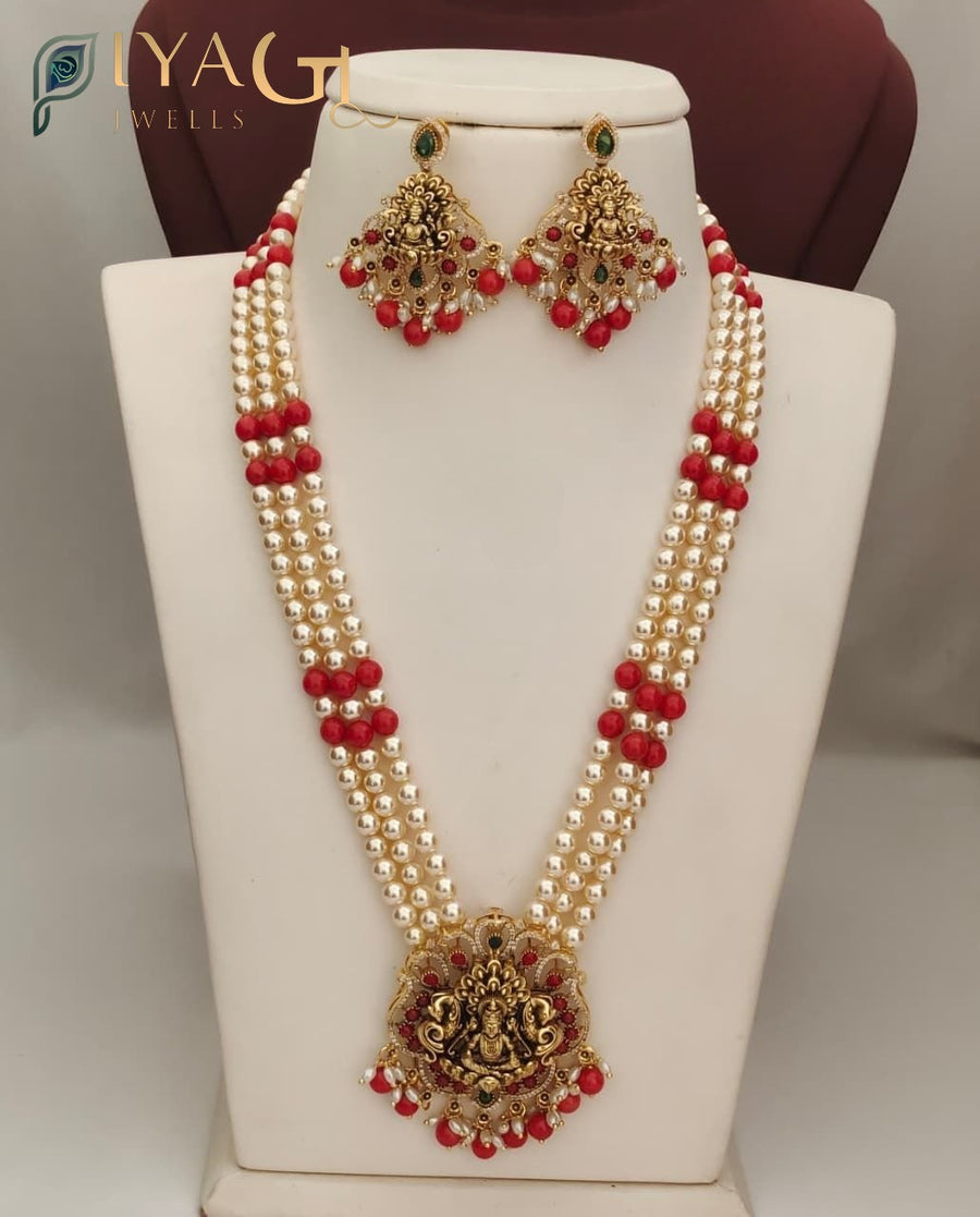 White and red bead necklace set with gold deity pendant on a mannequin - PiyaGuJwells
