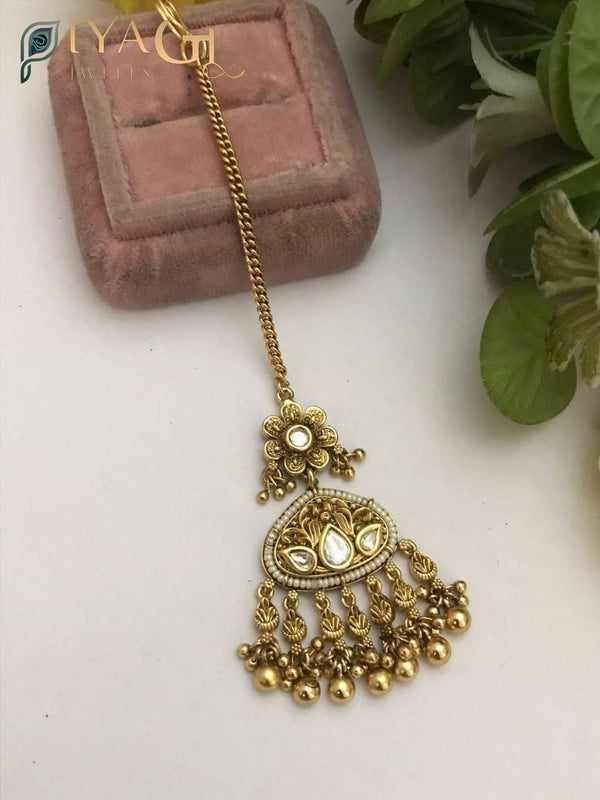 Gold platted floral design white Stone stone maang tikka for ethnic occasions - PiyaGuJwells