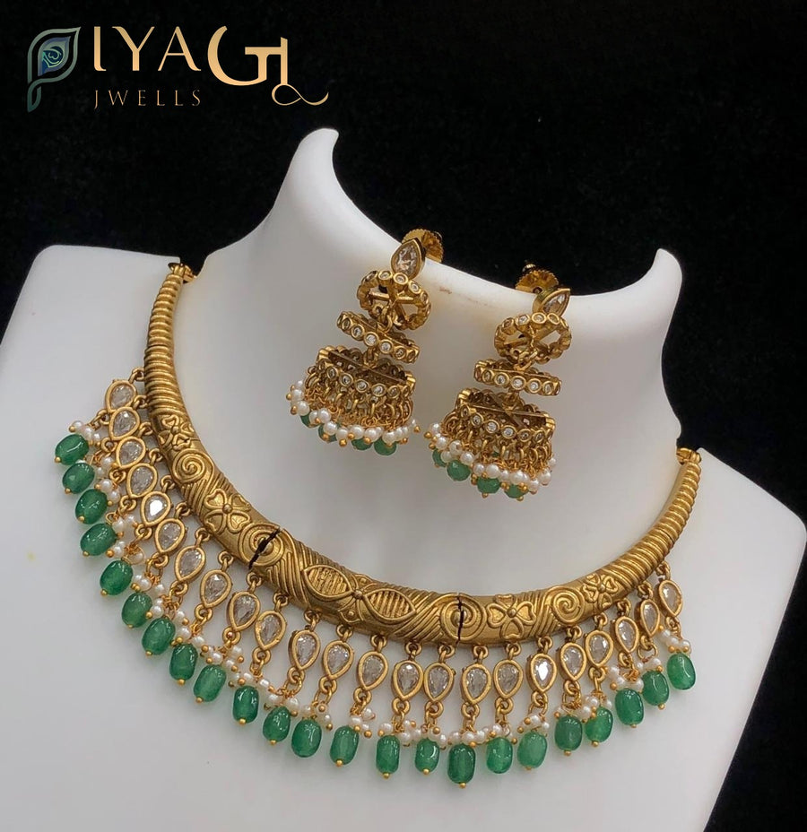 Gold polished stone floral design medium-sized choker necklace for festive events - PiyaGuJwells