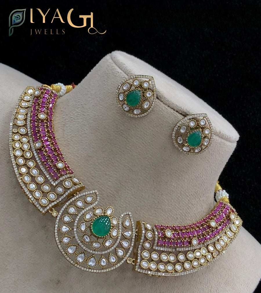 Gold polished layered green stone choker necklace for festive occasions - PiyaGuJwells