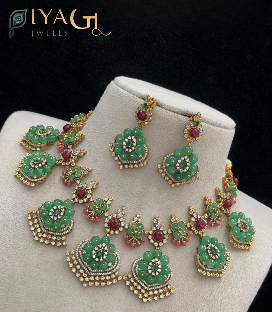 Gold polished floral design green stone choker necklace for ethnic events - PiyaGuJwells