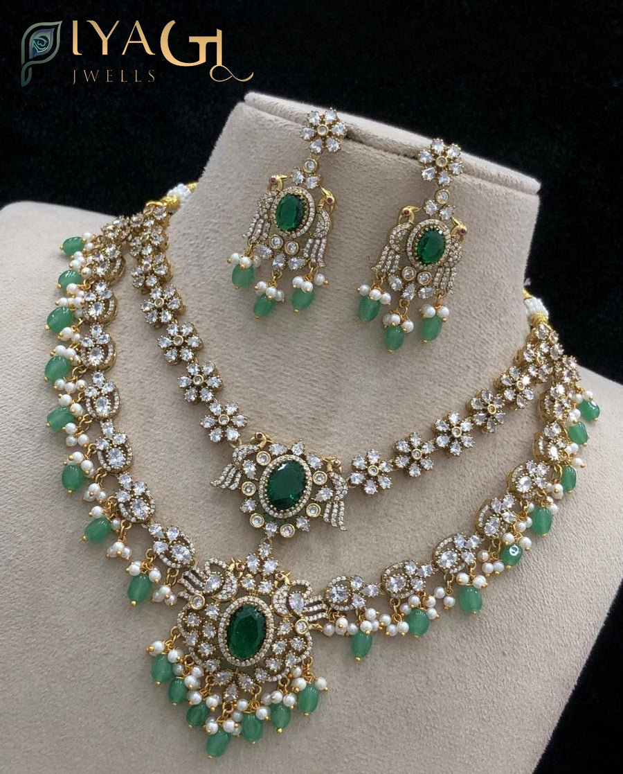 White green pink stone polished floral layered artificial jewellery necklace set for ethnic festivities - PiyaGuJwells