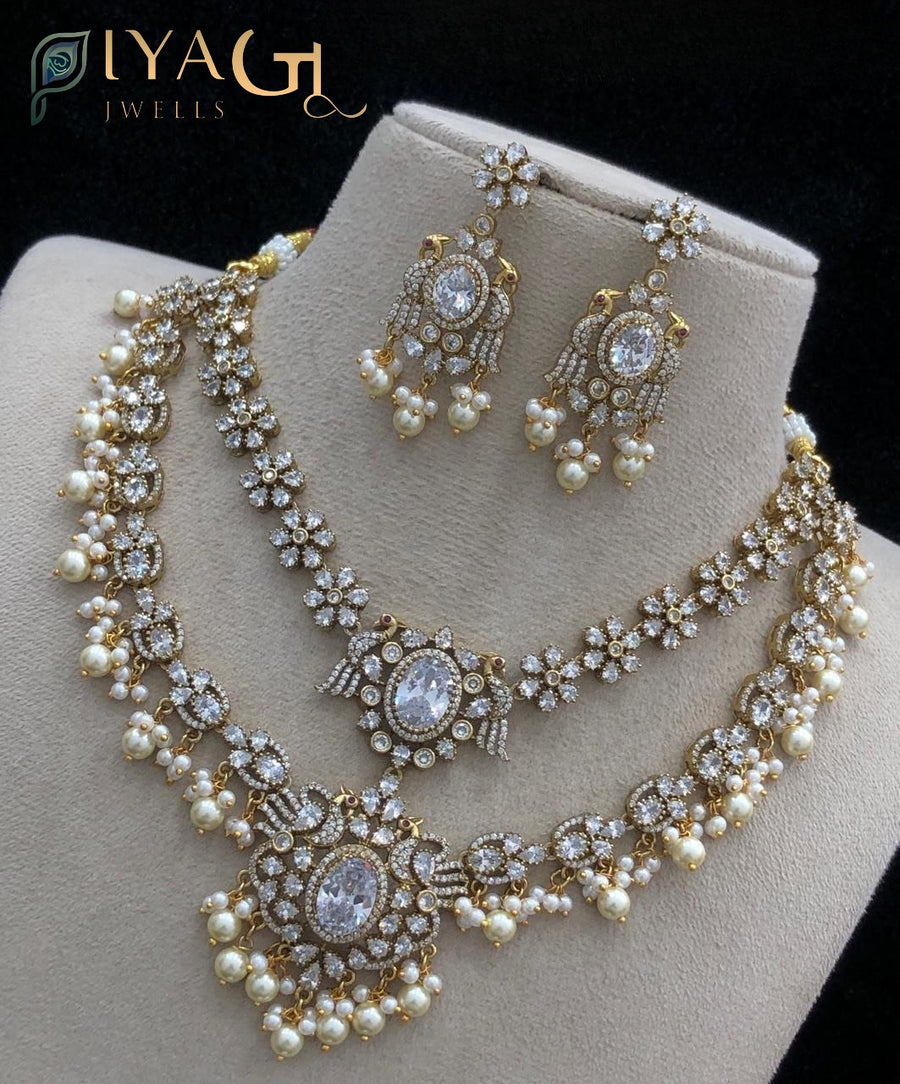 White green pink stone polished floral layered artificial jewellery necklace set for ethnic festivities - PiyaGuJwells