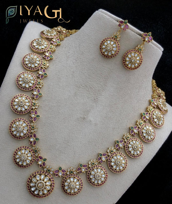 Gold tone stone polished floral layered necklace set for festive occasions - PiyaGuJwells
