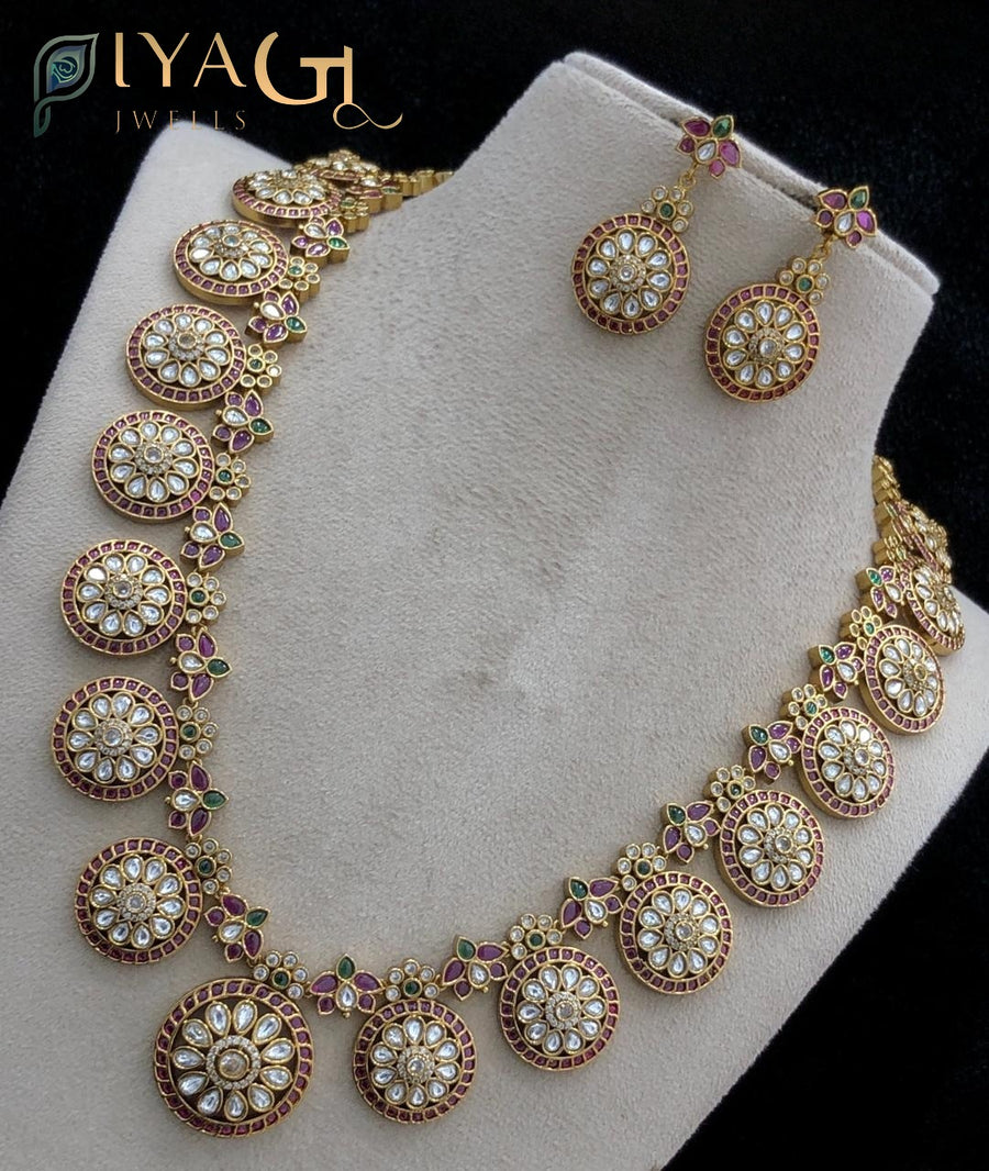 Gold tone stone polished floral layered necklace set for festive occasions - PiyaGuJwells